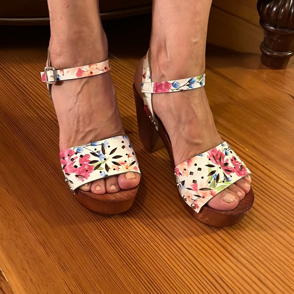 Madden girl size 6 platforms with strap and floral design.